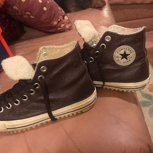 Brown leather converse